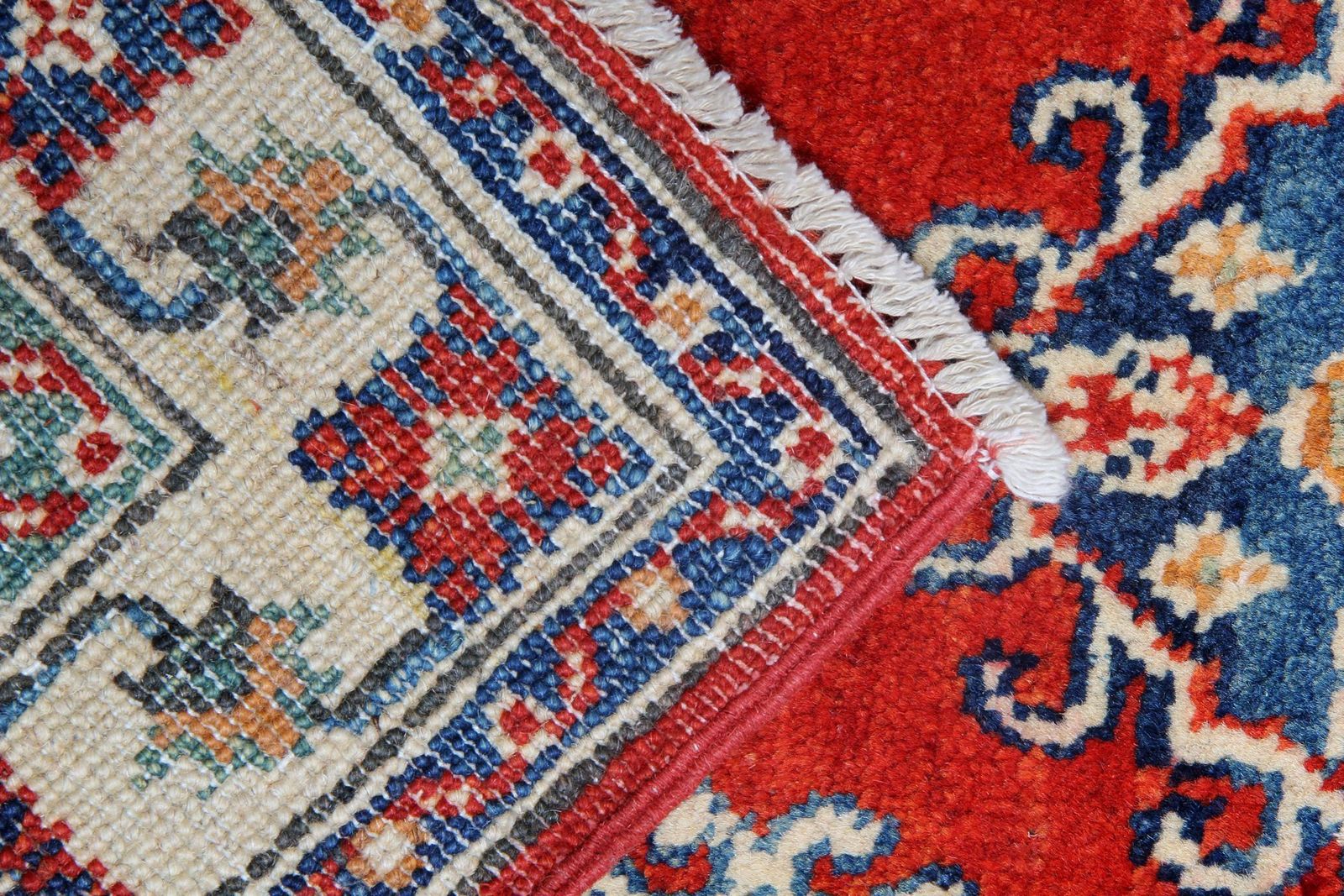 Tapis orientaux, tapis fait main crème à motifs géométriques photo Textiles