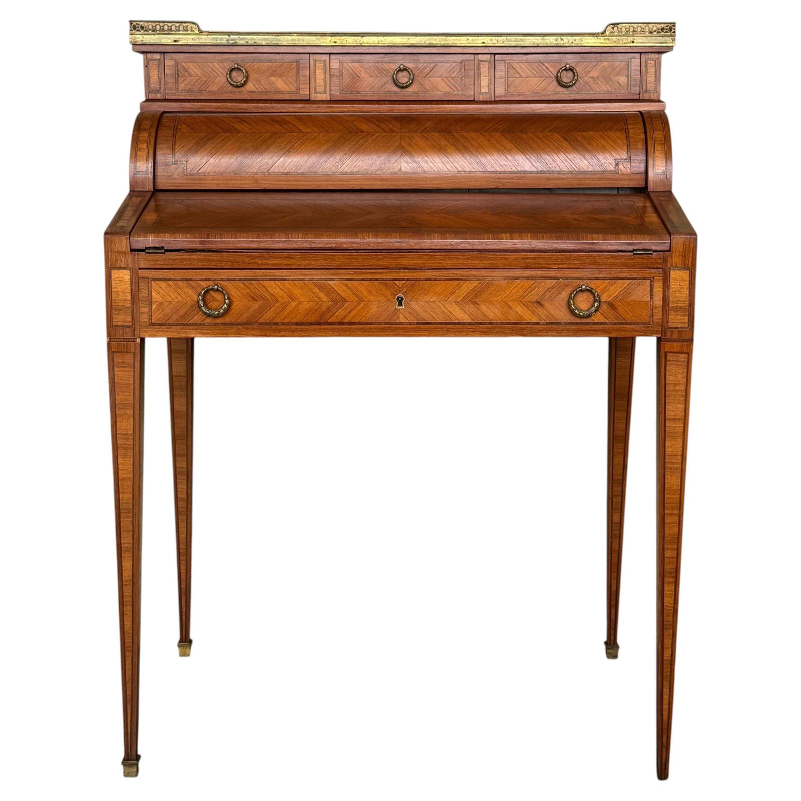 Bureau à cylindre de style Louis XVI, marqueterie et galerie en laiton