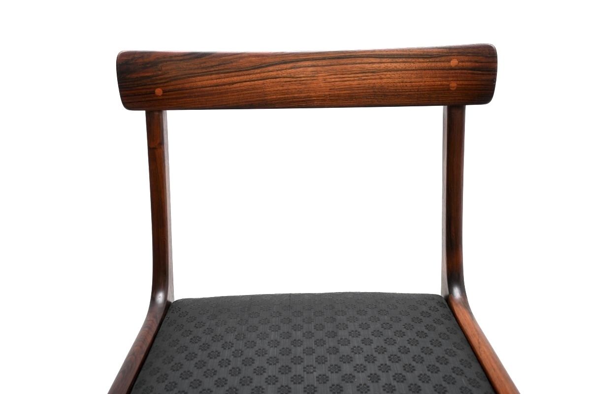 photo vintage Set Of Ten Vintage Danish Rosewood Dining Chairs By Ole Wanscher.