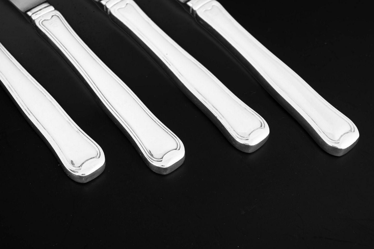 Georg Jensen, set de quatre couteaux à déjeuner en acier inoxydable et argent sterling. photo for sale