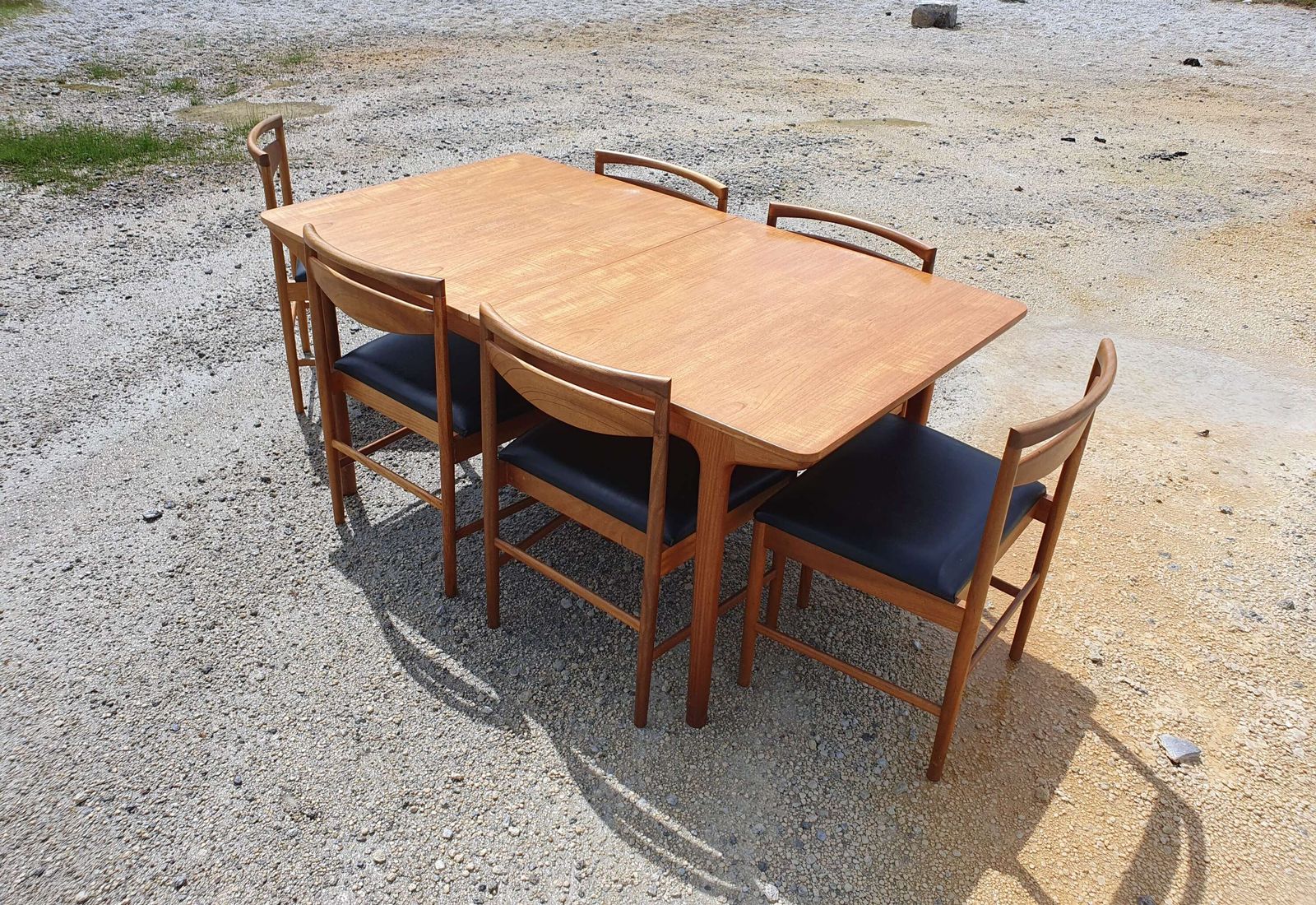 photo buy A Mid 20thc Teak, Extending Dining Table And Six Chairs By McIntosh Of Kirkcaldy.