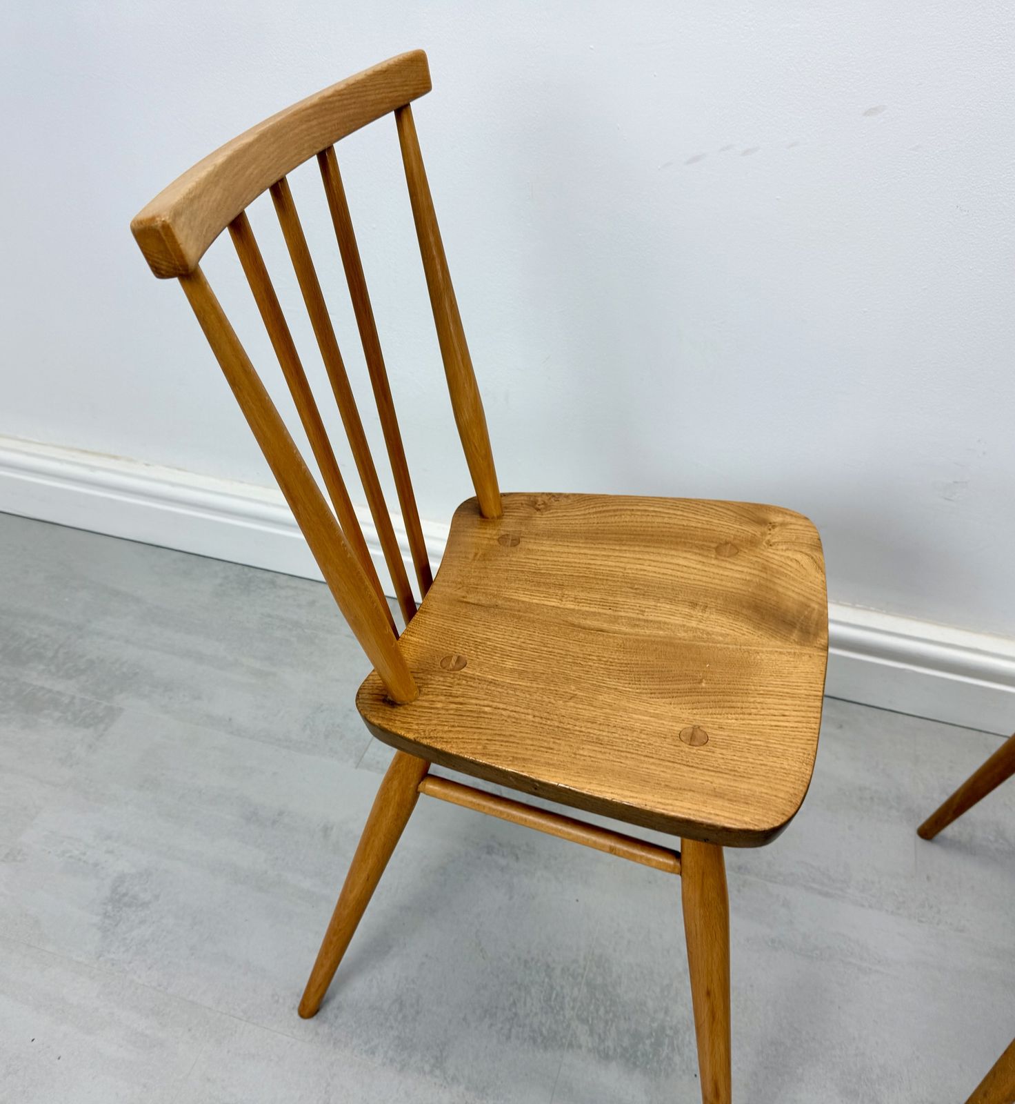 Two Ercol Stick Back Dining Chairs photo 320.0