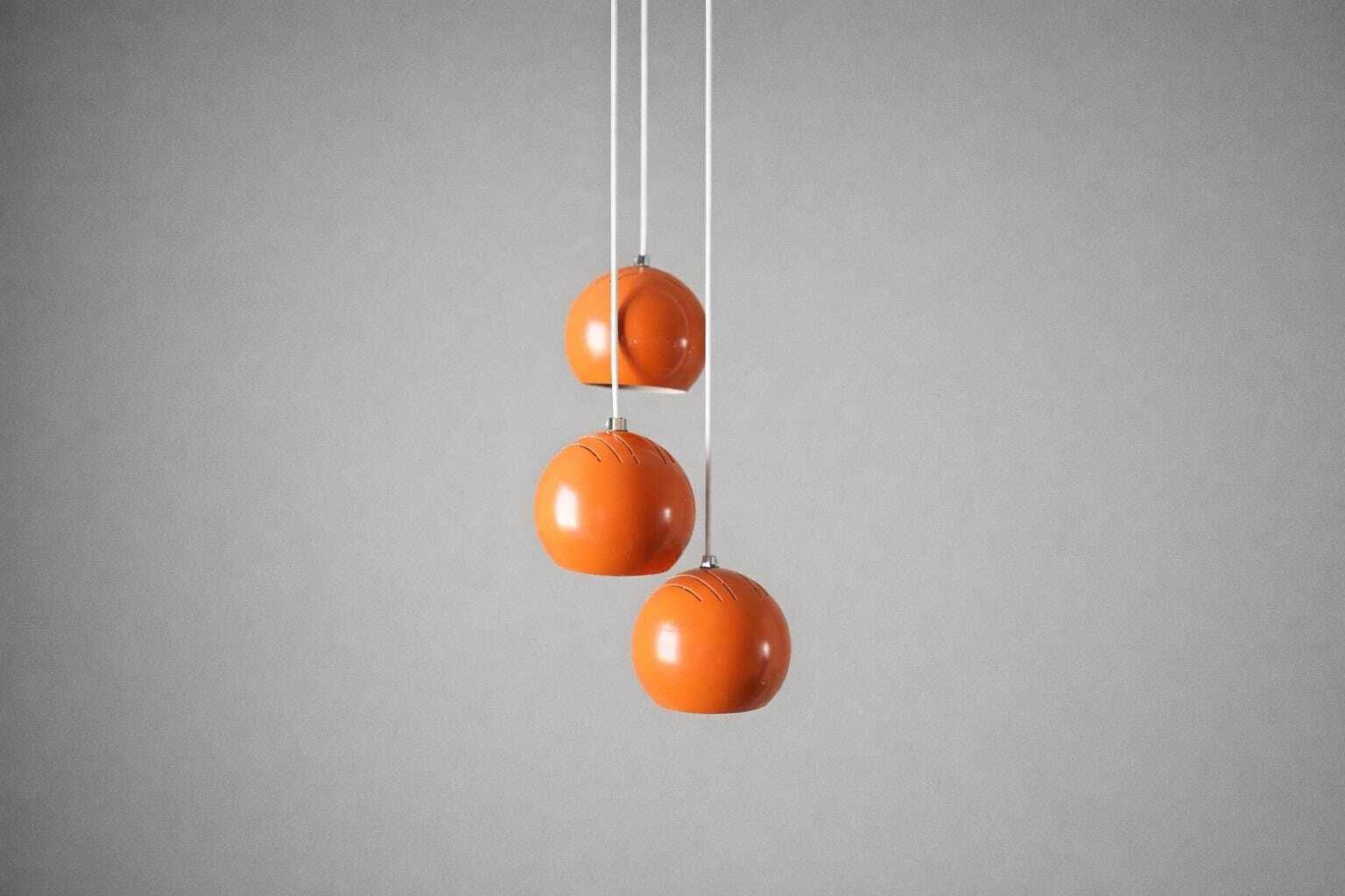 photo for sale Set van 3 oranje cascade hanglampen – Space Age bollampen, jaren 1970