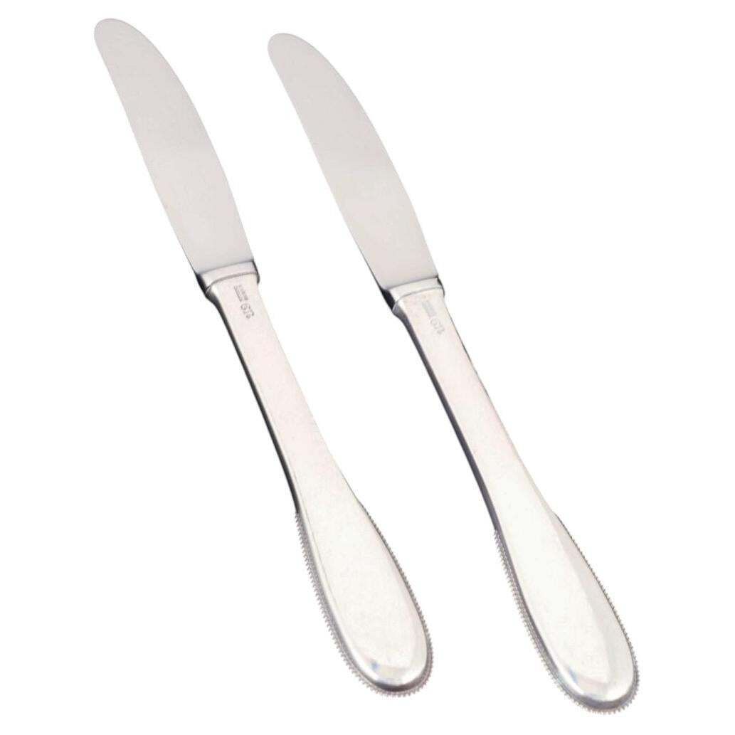 Evald Nielsen. Deux couteaux à déjeuner en argent sterling et acier inoxydable. Années 1930