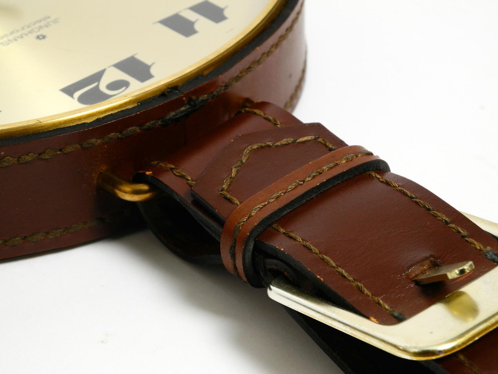 432.0 Original 1960s Junghans Brass Wall Clock With A Genuine Leather Strap photo