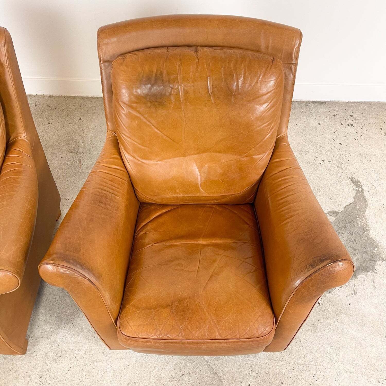 photo for sale Set Of 2 Vintage Cognac Leather Armchairs