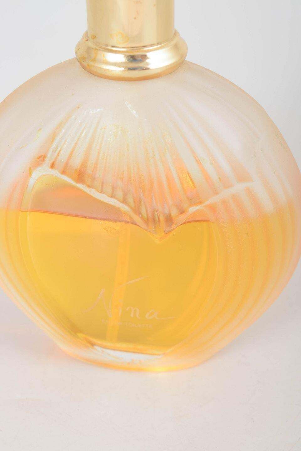 Flacon de parfum Nina Ricci « Nina » par Lalique, années 1980 photo for sale