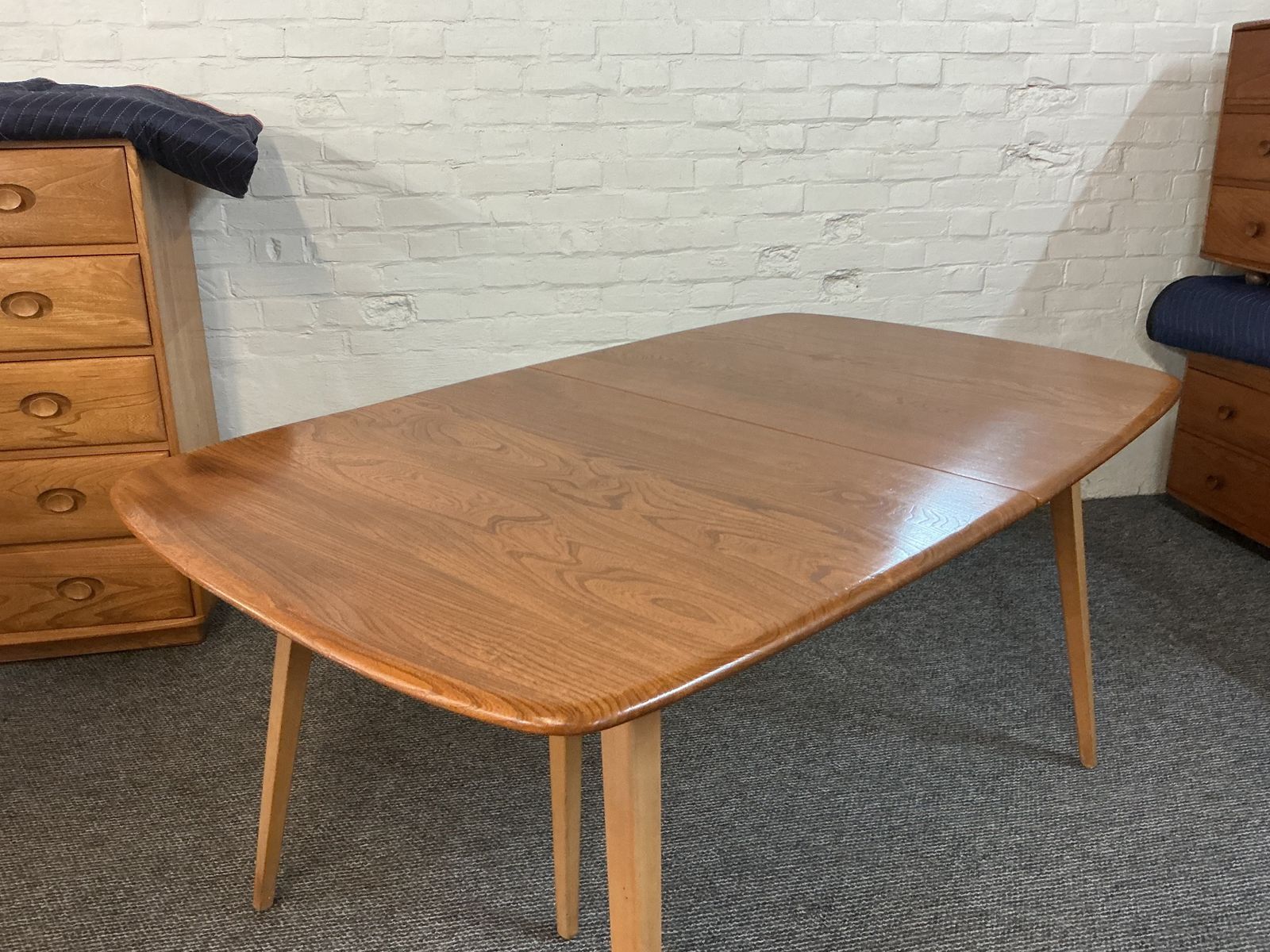 photo furniture Ercol Grand Windsor Extending Plank Dining Table.