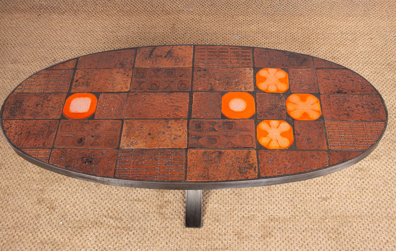 Table basse en pierre de lave, céramique et acier, par Jean Jaffeux, 1960. photo 2500.0