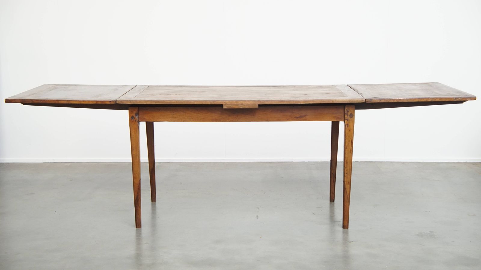 Functional And Beautiful Antique English Extendable Dining Table Made Of Elm And Cherry Wood photo for sale