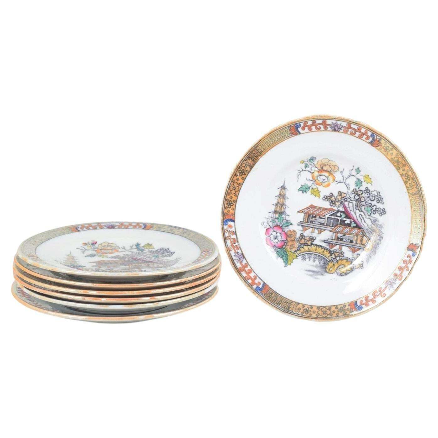 Rörstrand, Zweden. Set van 7 "Japan" faience borden, begin 20e eeuw.