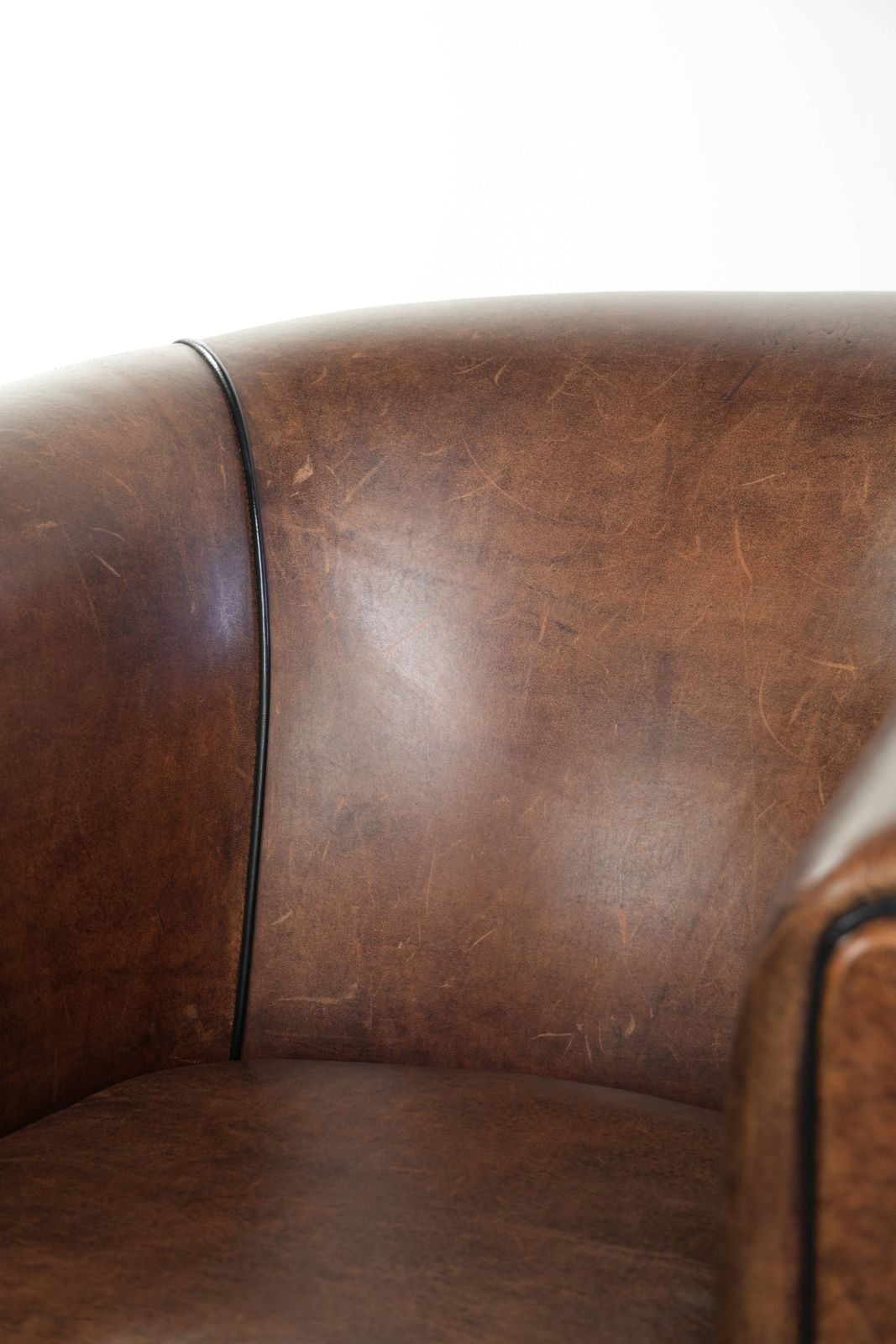 photo for sale Nice And Sleek Art Deco Designed Sheepskin Club Armchair Finished With Black Piping