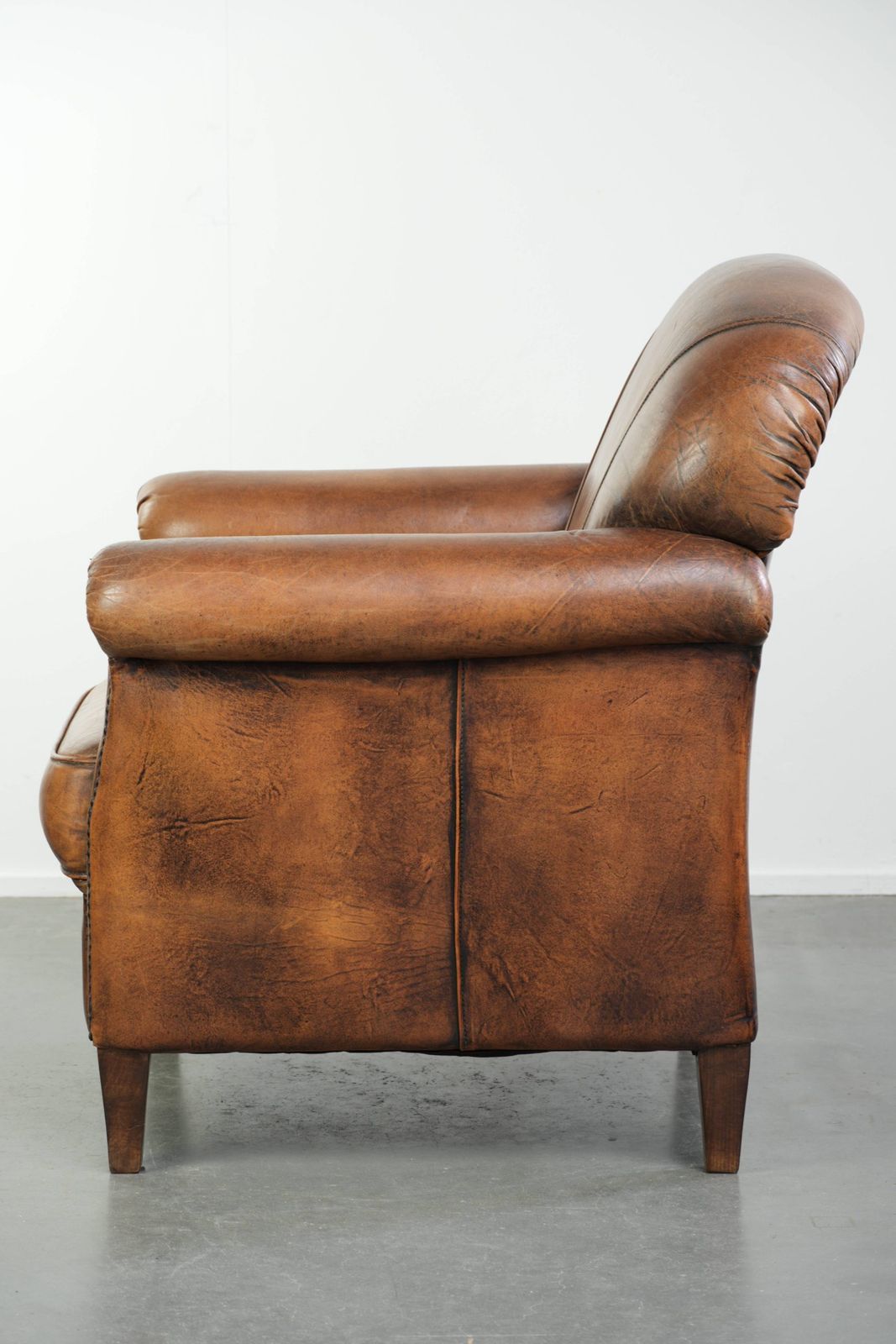 Comfortable, Characterful Sheepskin Armchair Finished With Decorative Nails And A Beautiful Patina photo 884.0
