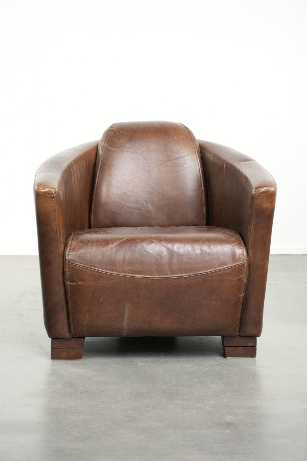 Characterful And Robust Dark Cognac Brown Cowhide Leather Aviator Design Armchair With An Interesting Shape photo furniture