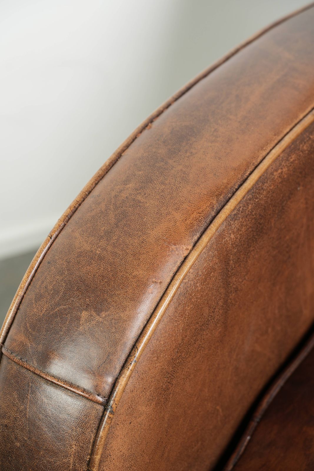 photo buy Fine Sheepskin Leather Armchair With A Beautiful Timeless Design And Gorgeous Warm Colors
