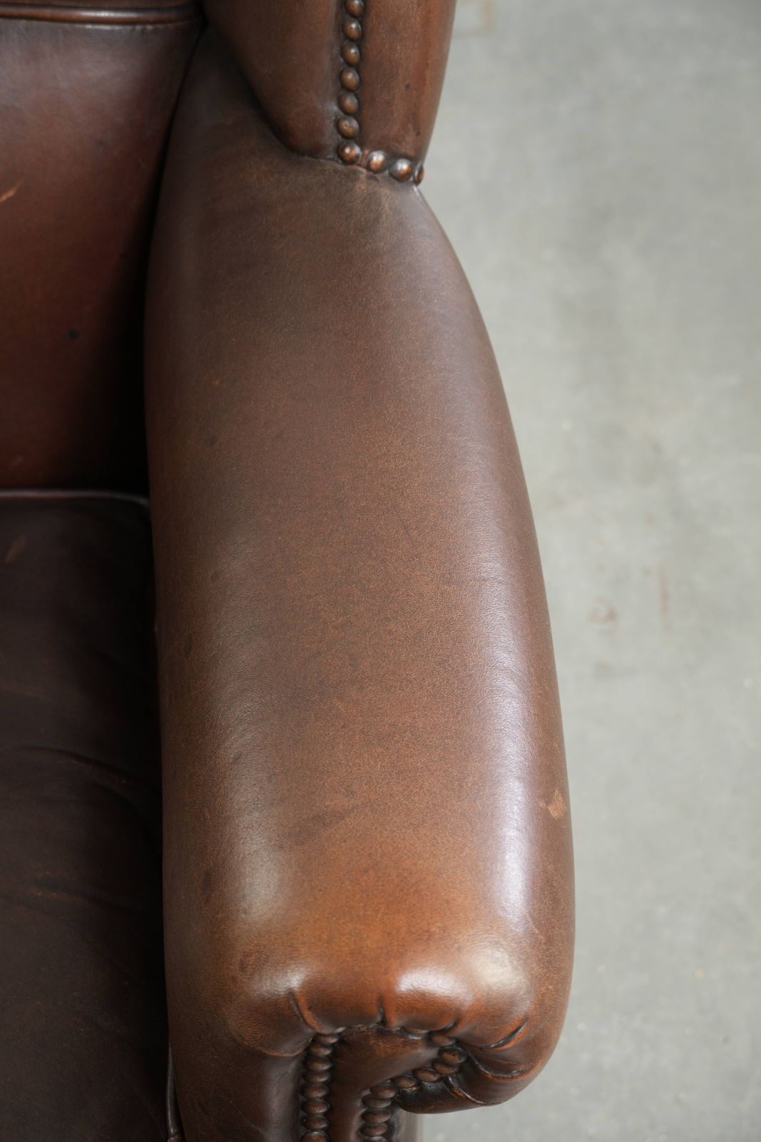 Beautiful, Subtle Sheepskin Wing Armchair With A Deep Cognac Color And A Comfortable Seat. photo vintage