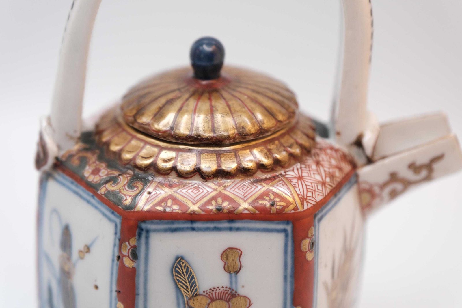 Antique Japanese Imari Porcelain Teapot, Hexagonal Form In The Arita Export Tradition, With A Fixed Overhead Porcelain Handle. photo for sale
