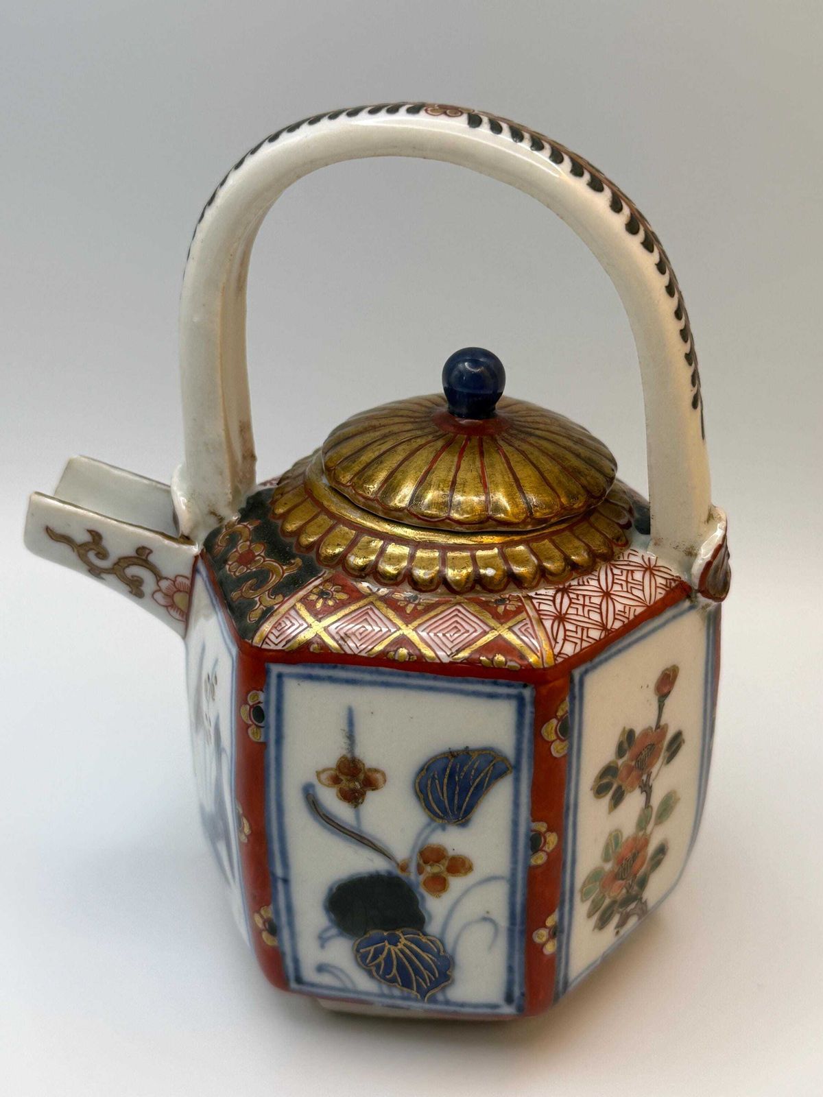 photo buy Antique Japanese Imari Porcelain Teapot, Hexagonal Form In The Arita Export Tradition, With A Fixed Overhead Porcelain Handle.