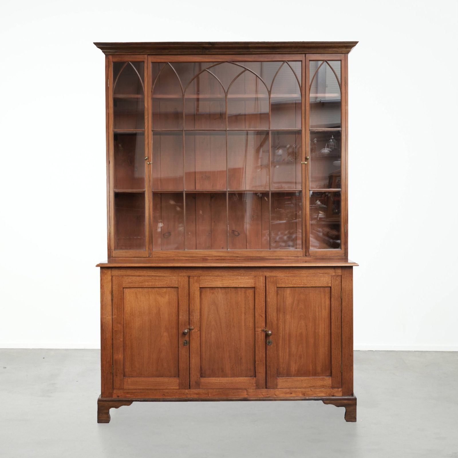 Beautiful Antique English Buffet Cabinet From The Early 19th Century In Gothic Style With Elegant Forms And Deep Colors.