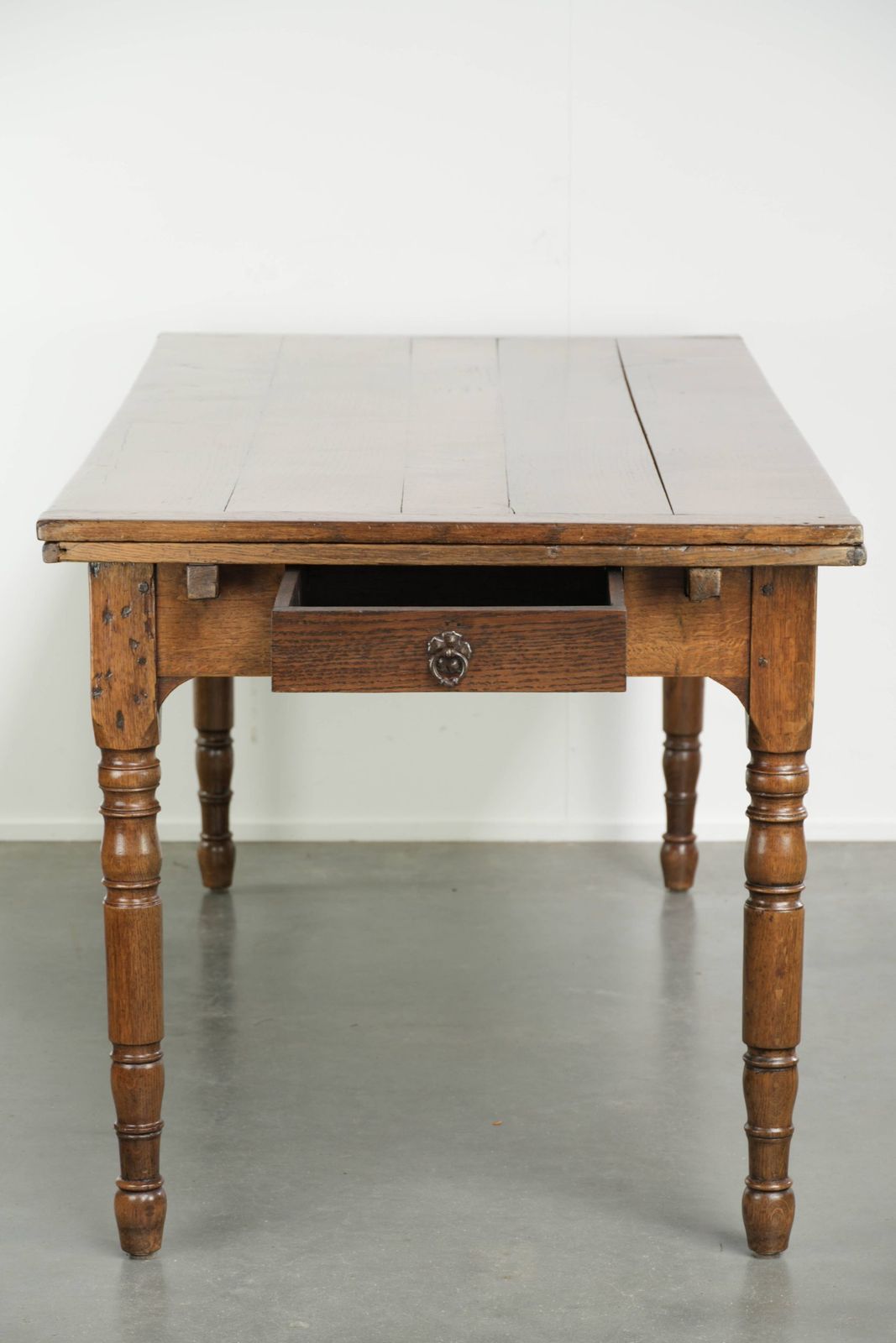 Original And Uniquely Large Antique Oak Dining Table From The Late 18th Century With Extendable Leaves And A Beautiful Patina. photo for sale