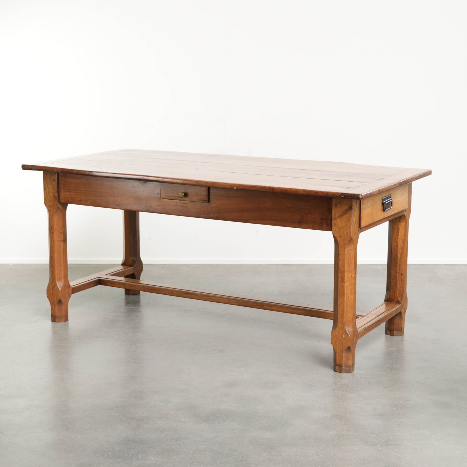 Characterful Antique French Dining Table From The 18th Century With A Fruitwood Top And An Oak Base.