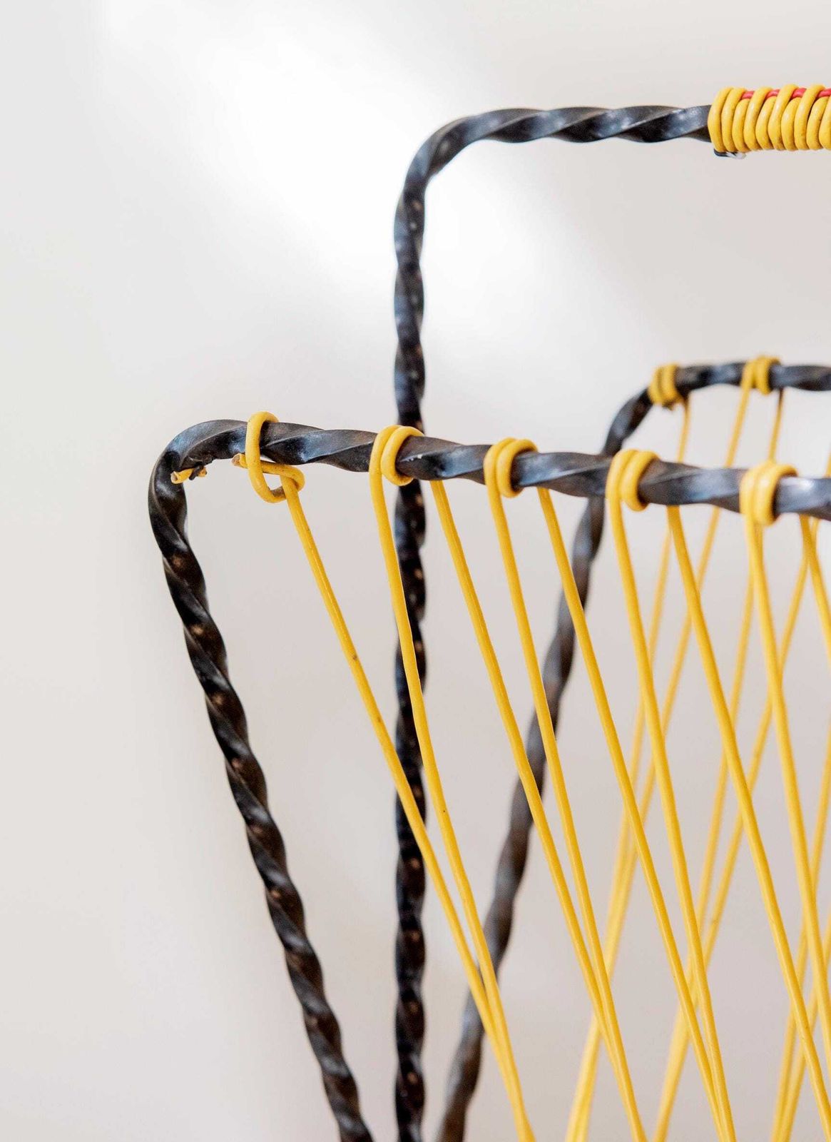 Home Decor Vintage Mid Century Magazine Rack   1950s Yellow Cord Magazine Holder   Black Twisted Metal Newspaper Rack photo