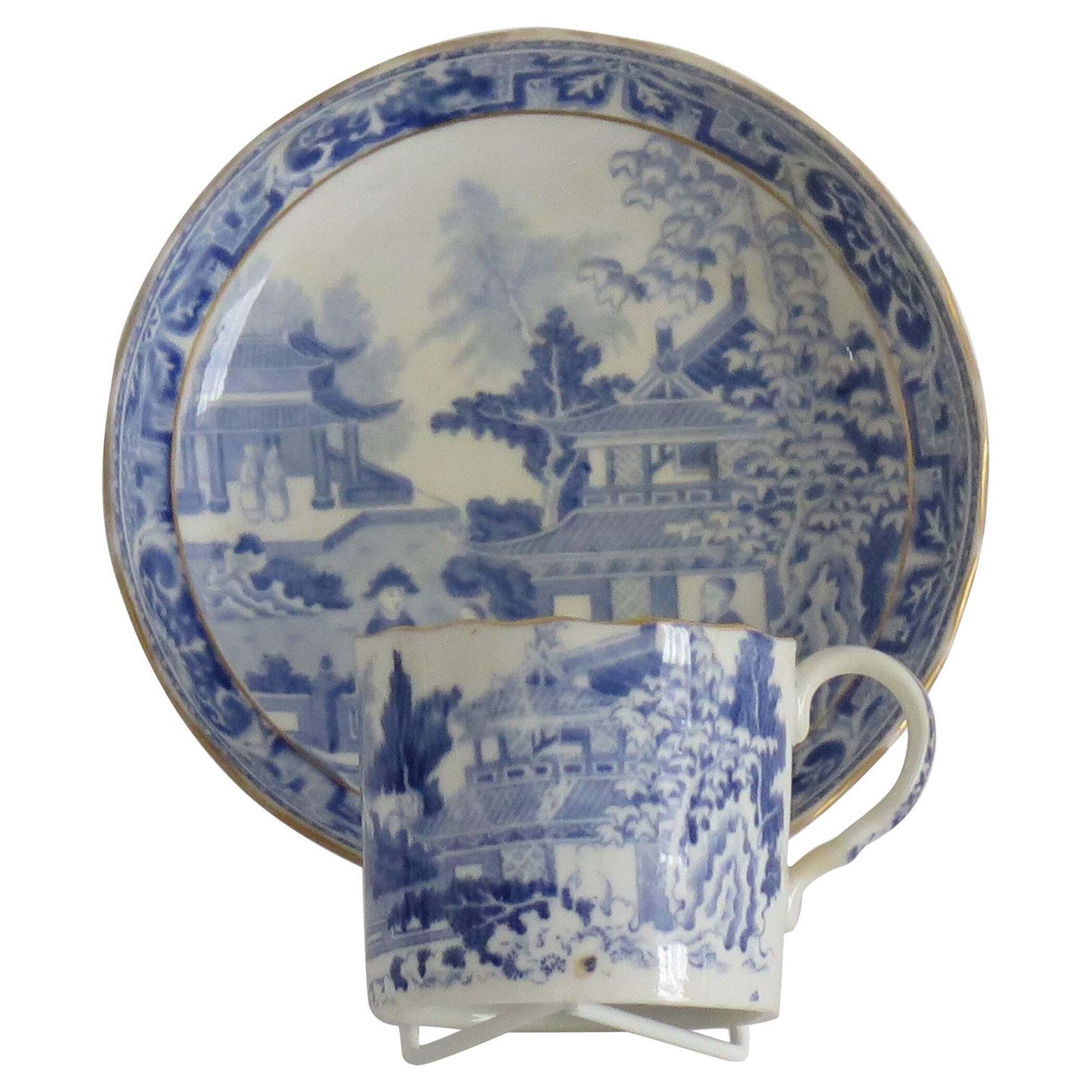 Miles Mason Porcelain Coffee Can & Saucer Blue And White Pattern, Circa 1805.