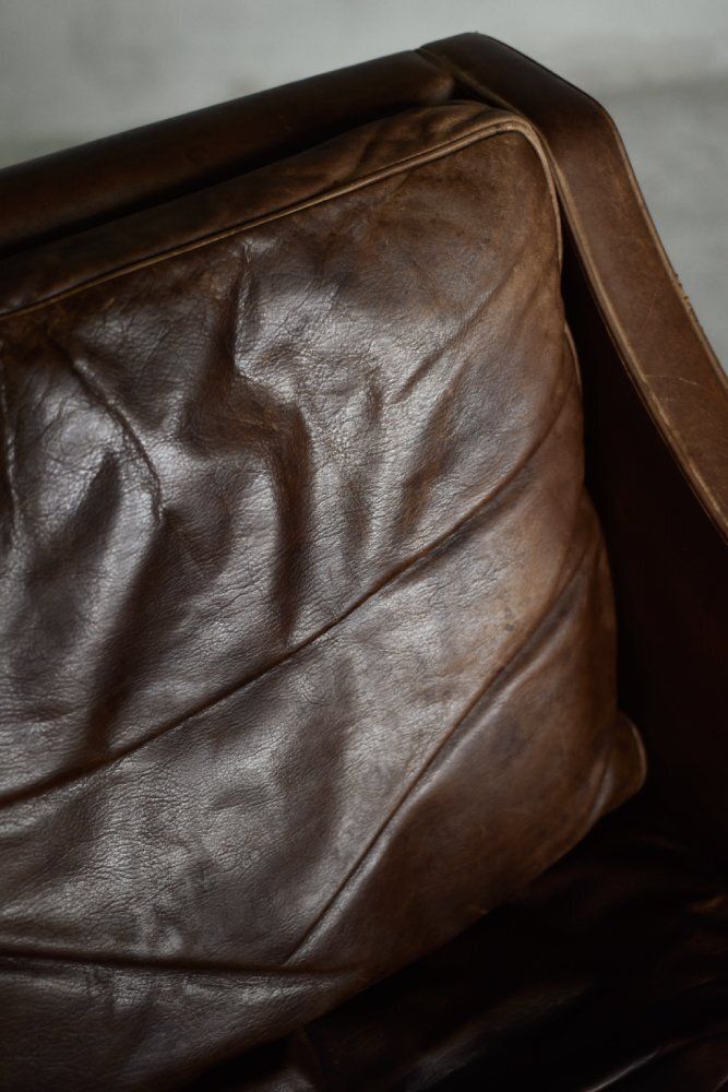 photo buy Set vintage Deens modern leren model 2207 lounge fauteuil en ottoman van Børge Mogensen voor Fredericia, ca. jaren 1960.