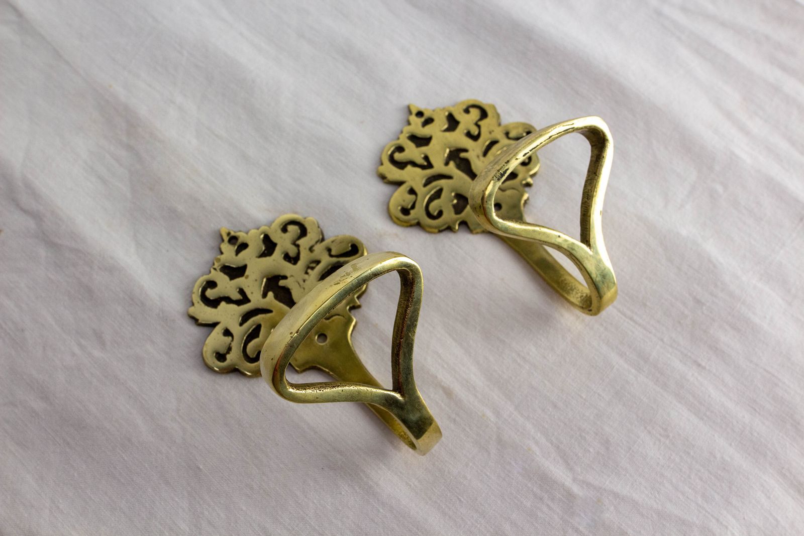 Paar haken, bronzen wandkapstokken ca. 1960 photo for sale
