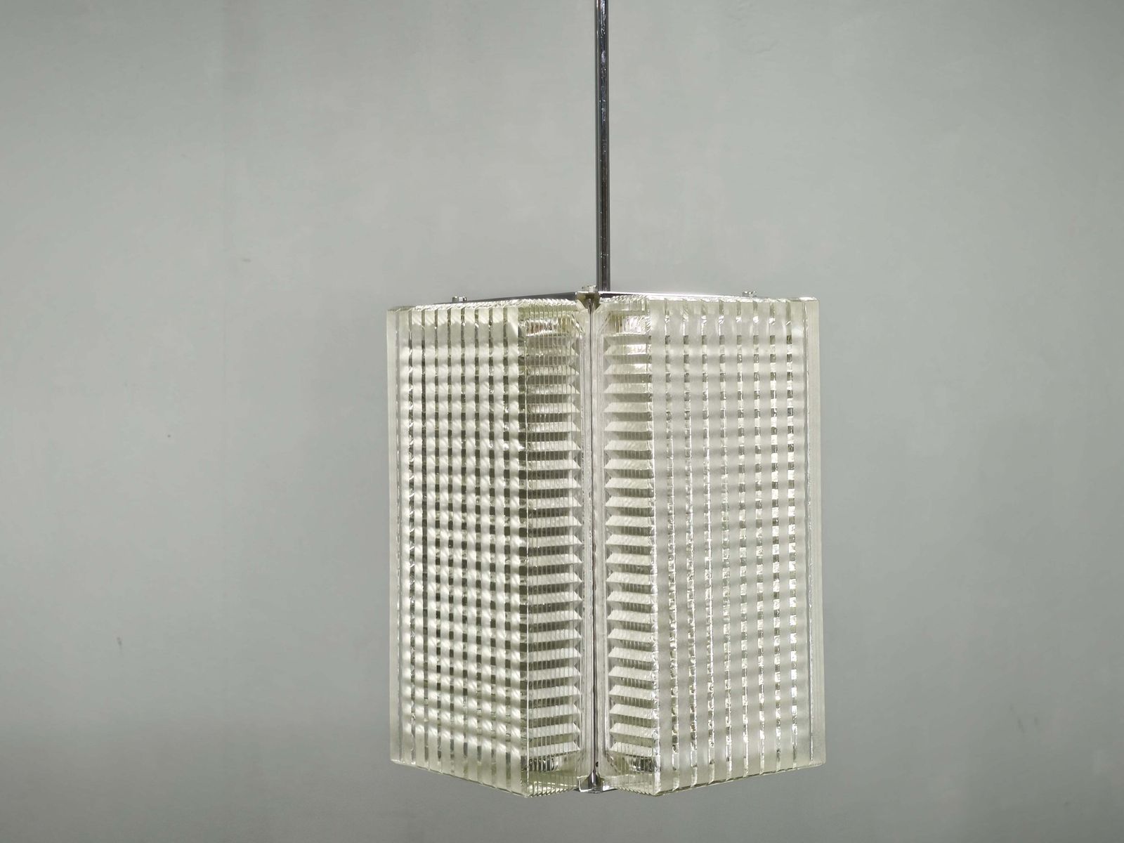 Pair Of Napako Chrome And Textured Glass Pendant Lights, 1970s photo for sale