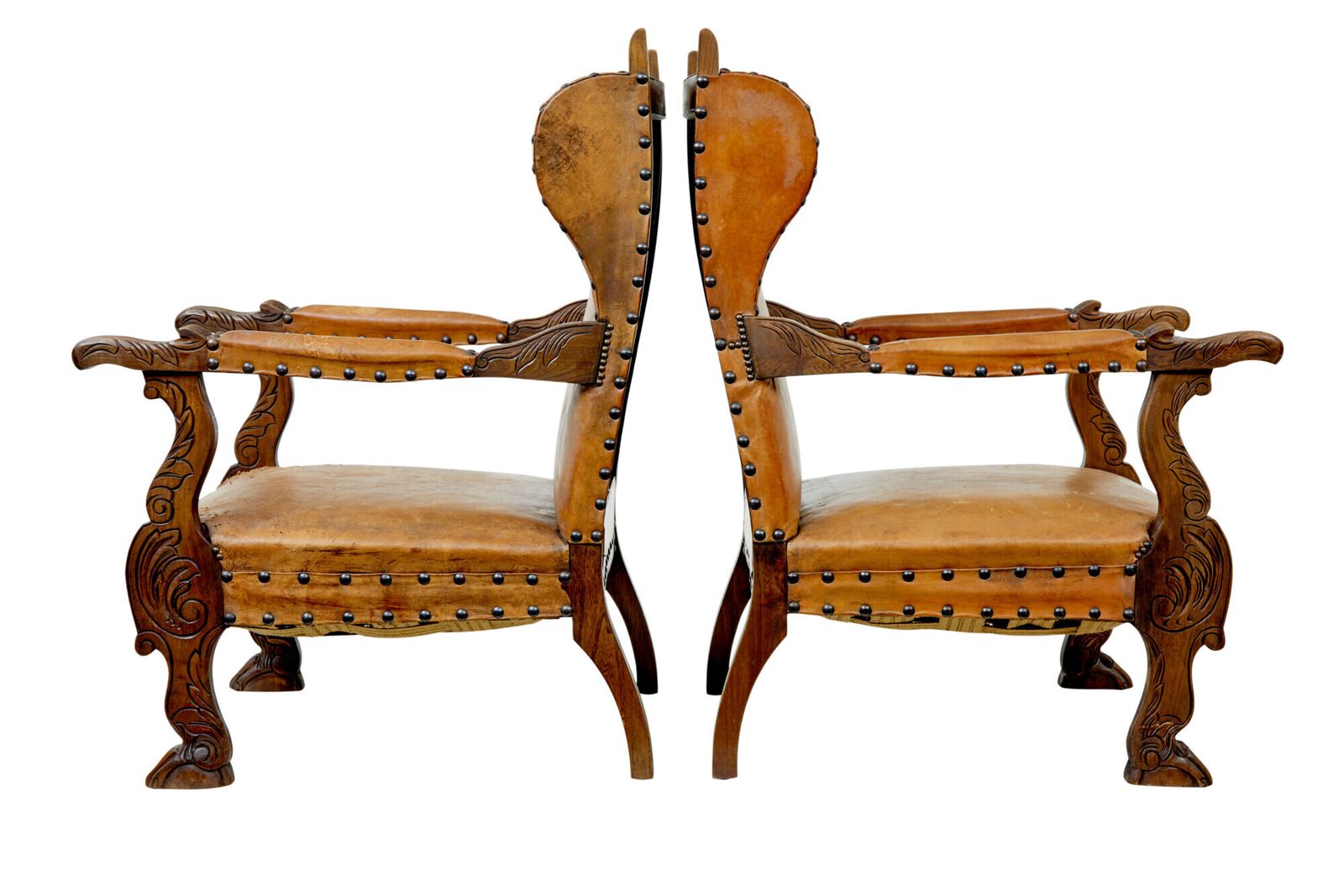 photo for sale Pair Of 19th Century Oak And Embossed Leather Armchairs