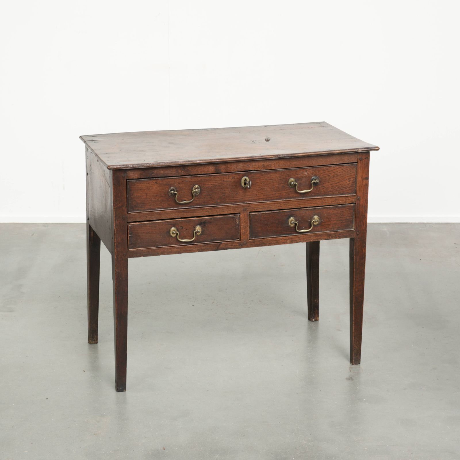 Antique English Lowboy Side Table From The 18th Century Made Of Oak With Beautiful Deep Colors.