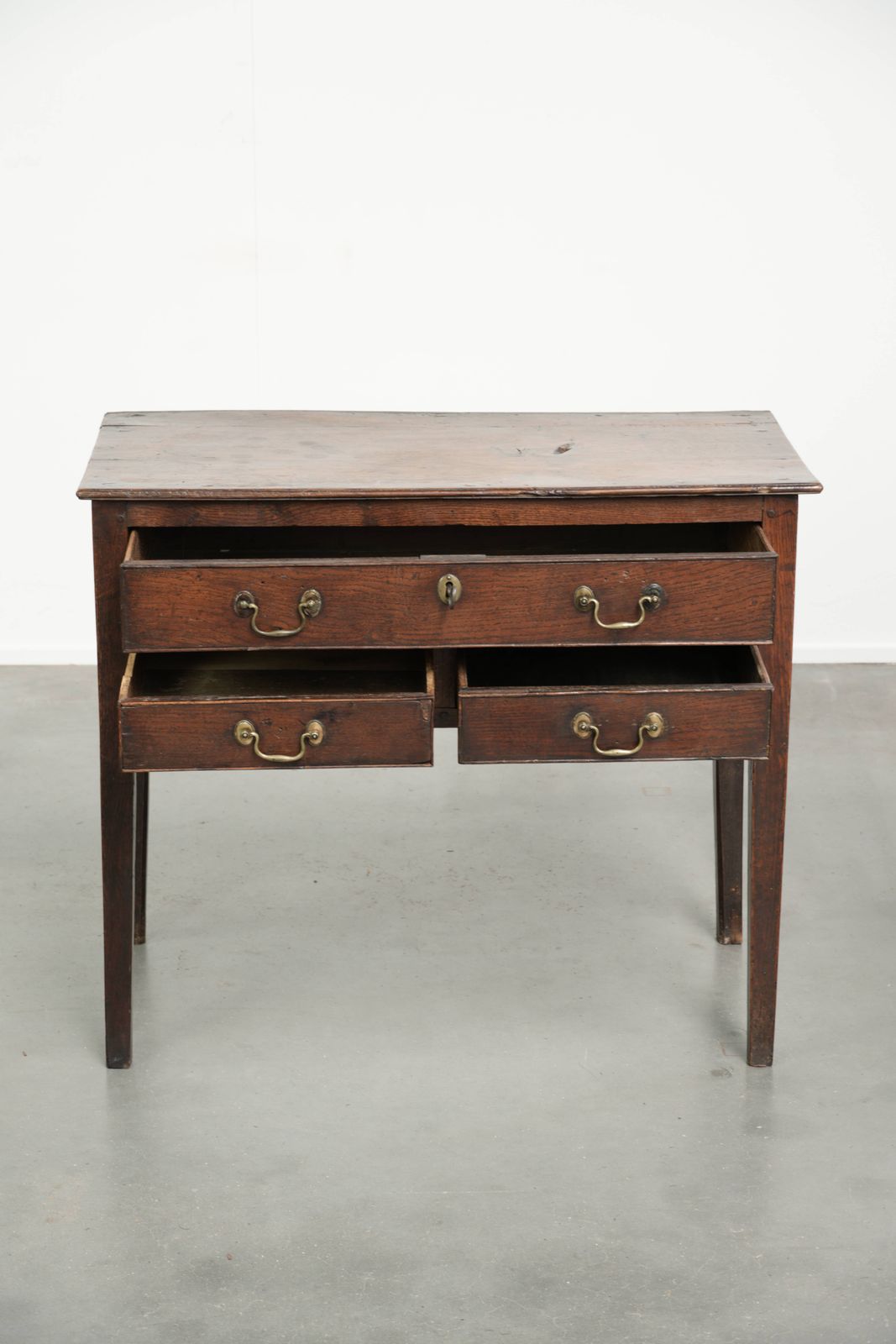 Antique English Lowboy Side Table From The 18th Century Made Of Oak With Beautiful Deep Colors. photo for sale