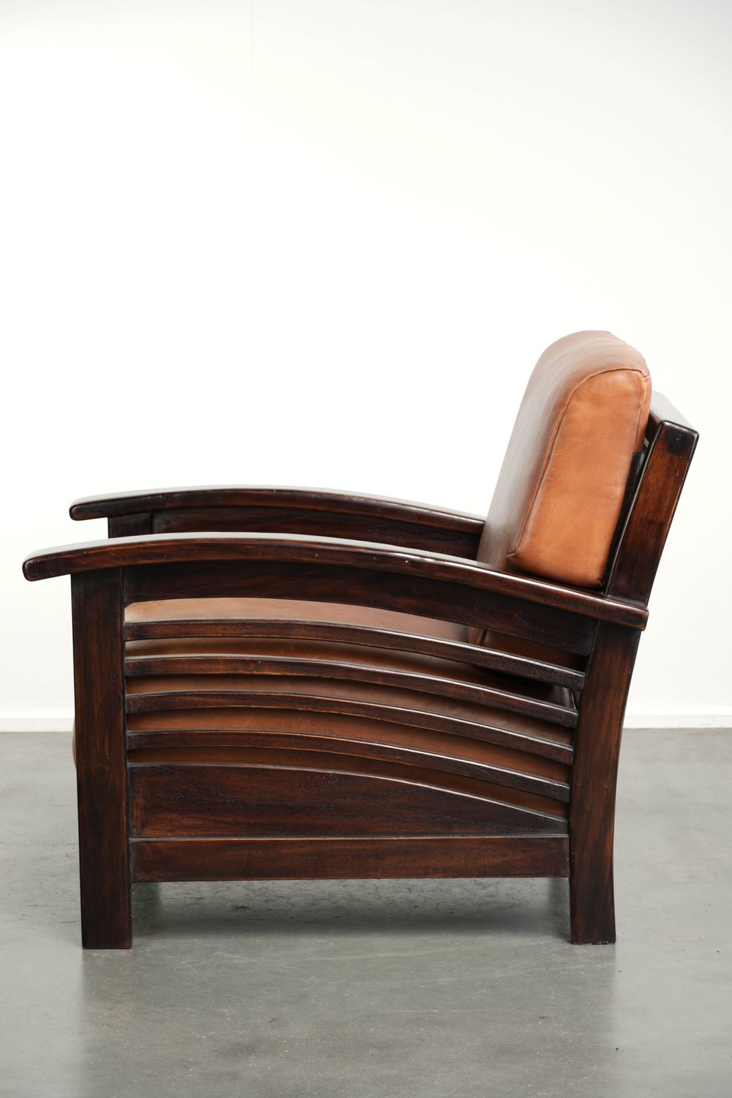 Elegant Cowhide Leather Armchair With Beautiful Details In A Timeless Art Deco Design photo 1278.0