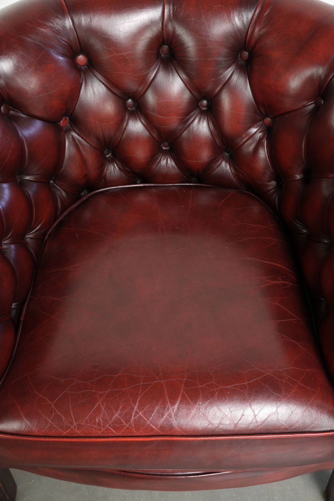 Nice, Subtle Cowhide Chesterfield Club Armchair In A Sought After And Timeless Red Color. photo vinterior