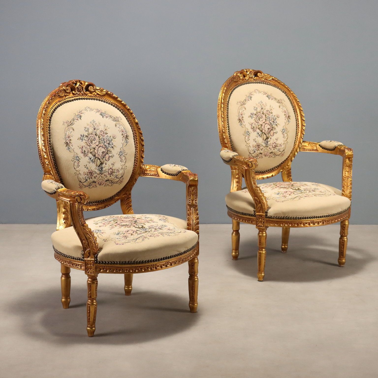 Pair Of Gilt Neoclassical Armchairs