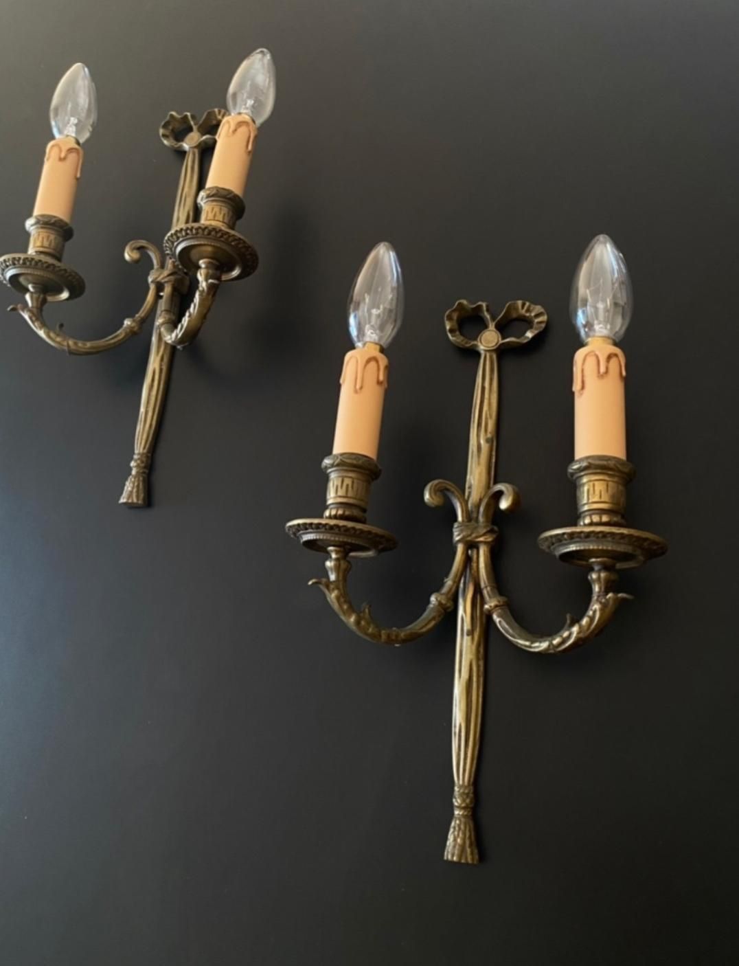 Een fraai paar antieke wandlampen. photo Verlichting