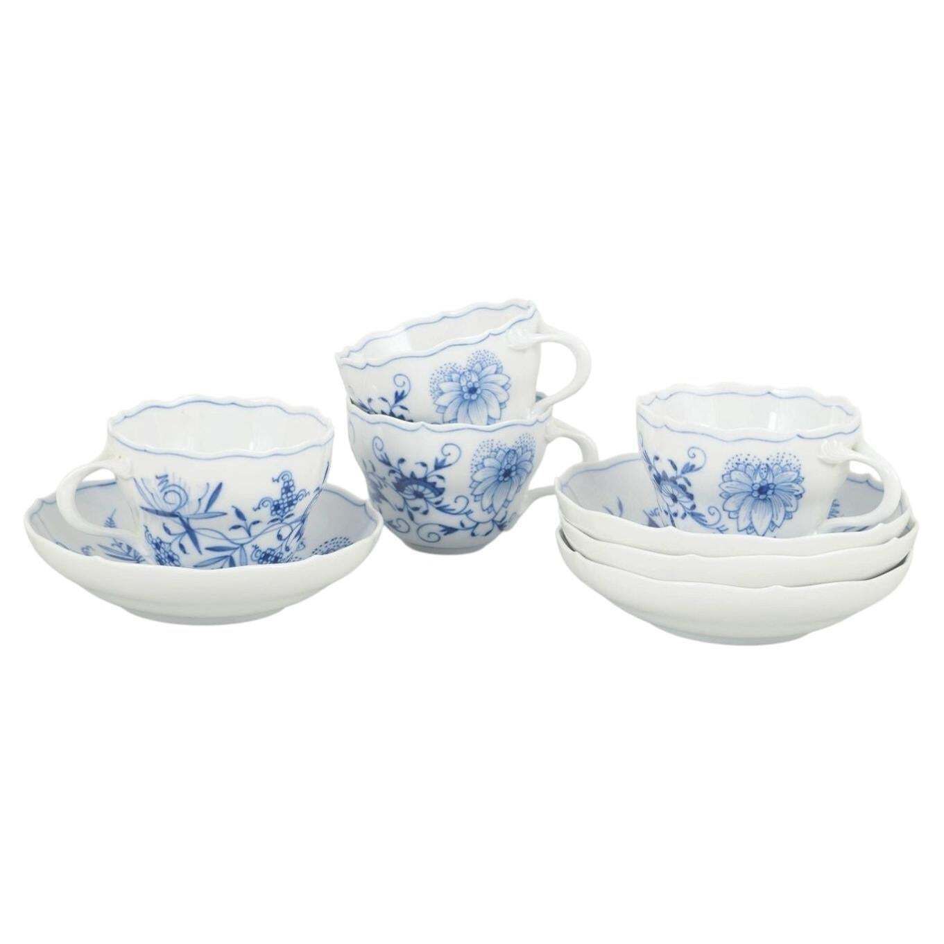 Meissen. Set Of Four Coffee Cups With Saucers, "Onion Pattern”. Mid 20th C.