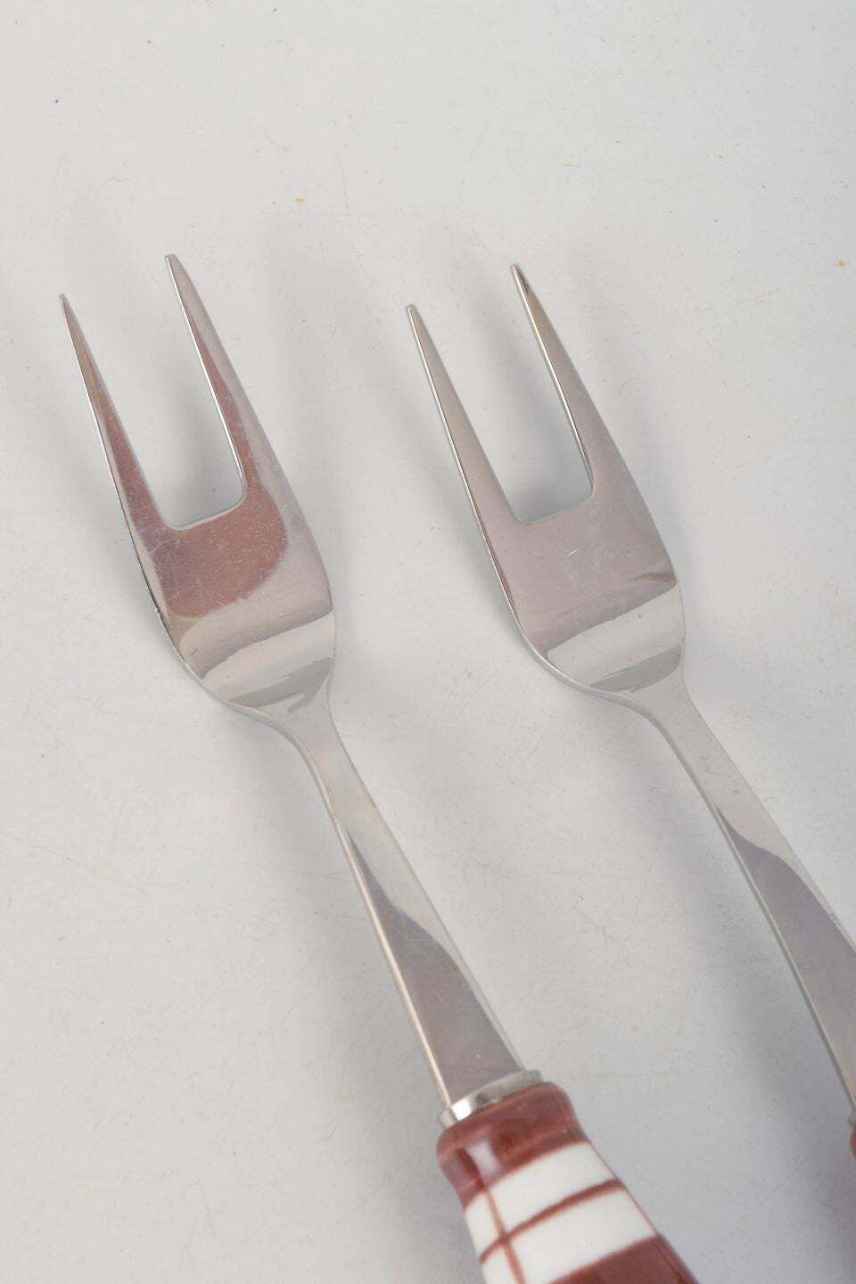 Bjørn Wiinblad, Rosenthal. Pair Of Meat Forks In Stainless Steel And Porcelain. photo for sale