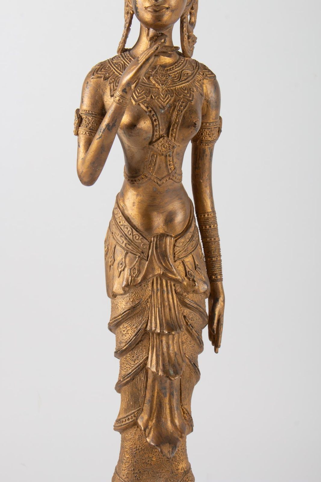Indonesian Goddess In Gilded Metal Holding A Lotus Flower, 1920 1940 photo for sale