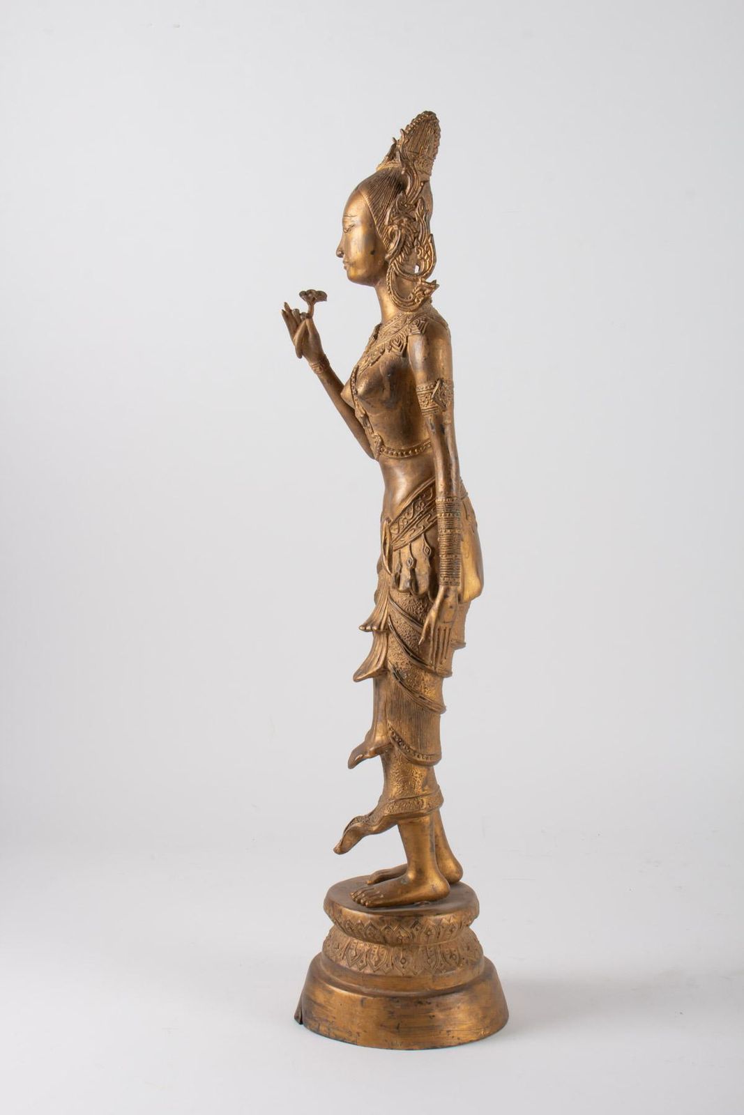 photo furniture Indonesian Goddess In Gilded Metal Holding A Lotus Flower, 1920 1940