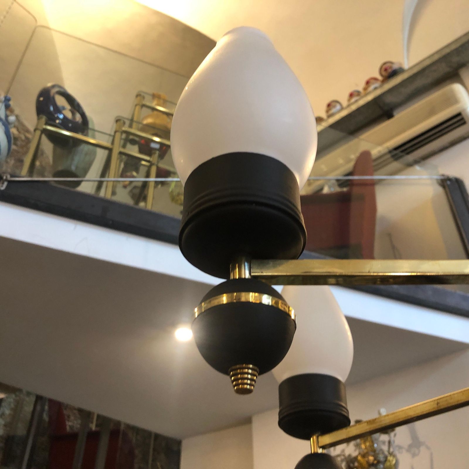 Mid Century Modern Brass And Black Metal Chandelier In The Manner Of Giò Ponti photo furniture