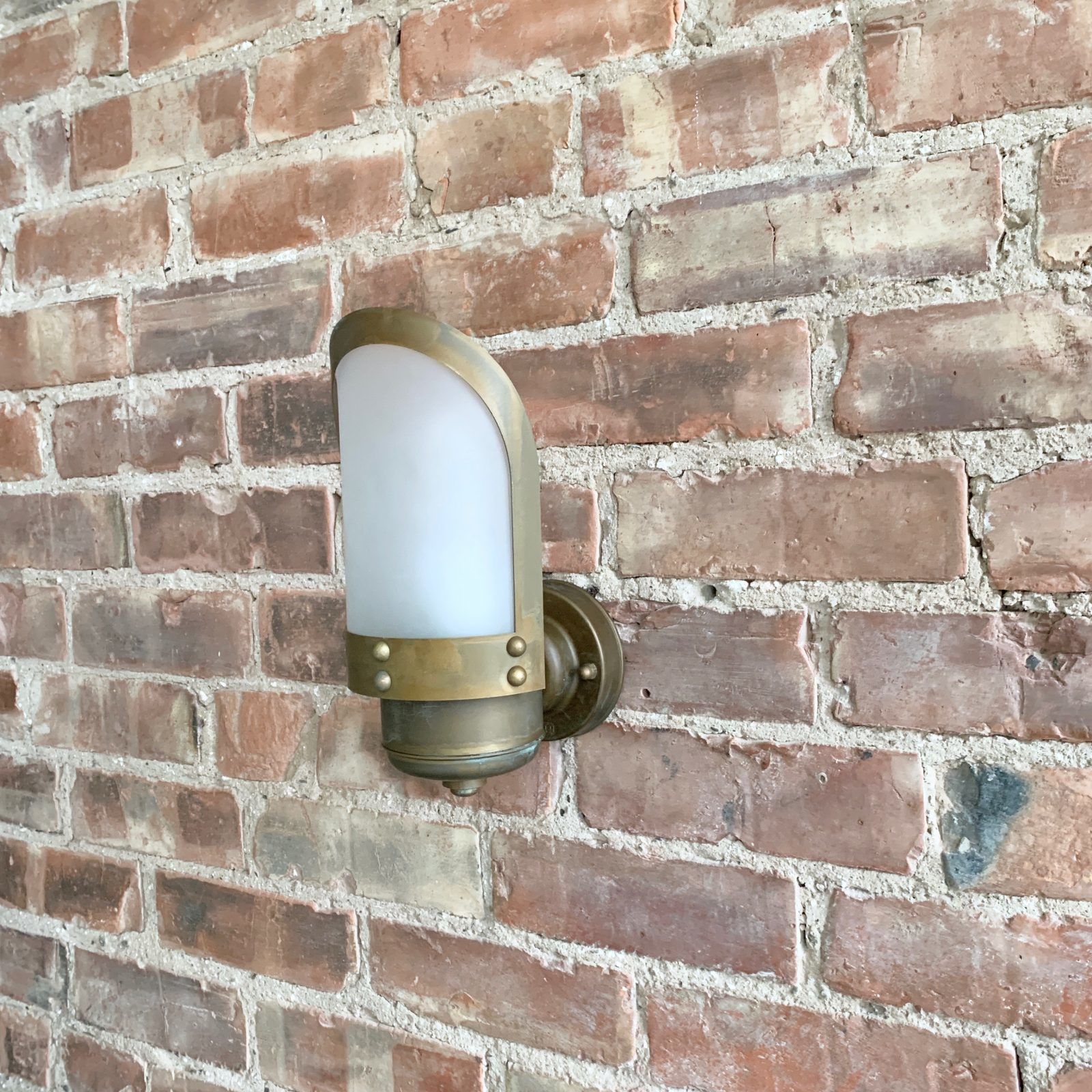 Contemporary Aged Brass Wall Light With Frosted Shade photo 272.0