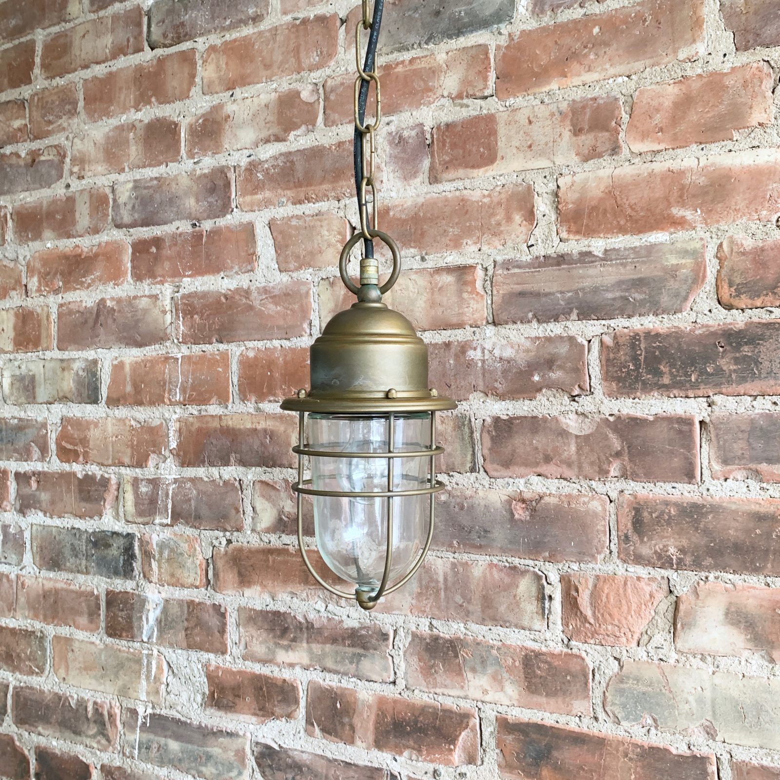 Contemporary Aged Brass Bulk Head Pendant photo Garden Lighting