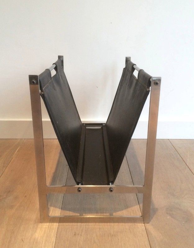 In The Style Of Poul Kjaerholm. Interesting Brished Steel And Leather Magazine Rack. Circa 1950 photo for sale