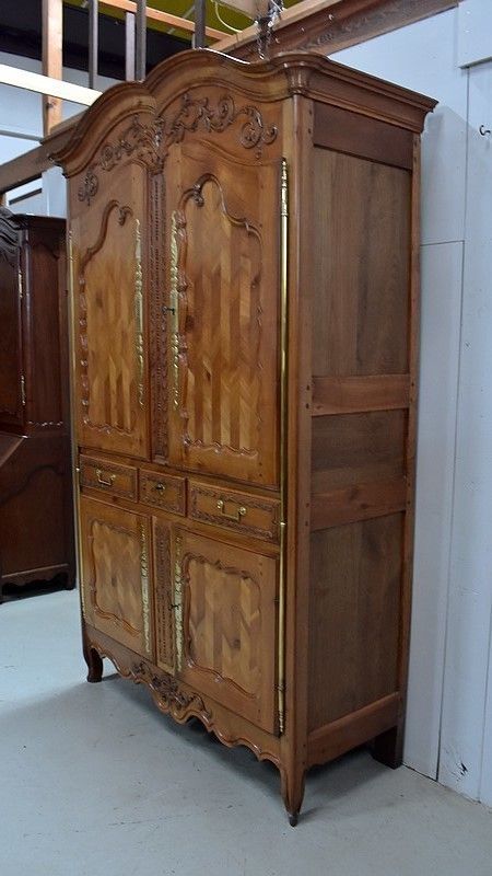 Four Doors Regional Cabinet, In Blond Cherry, Louis XV Period   1810/1820 photo for sale