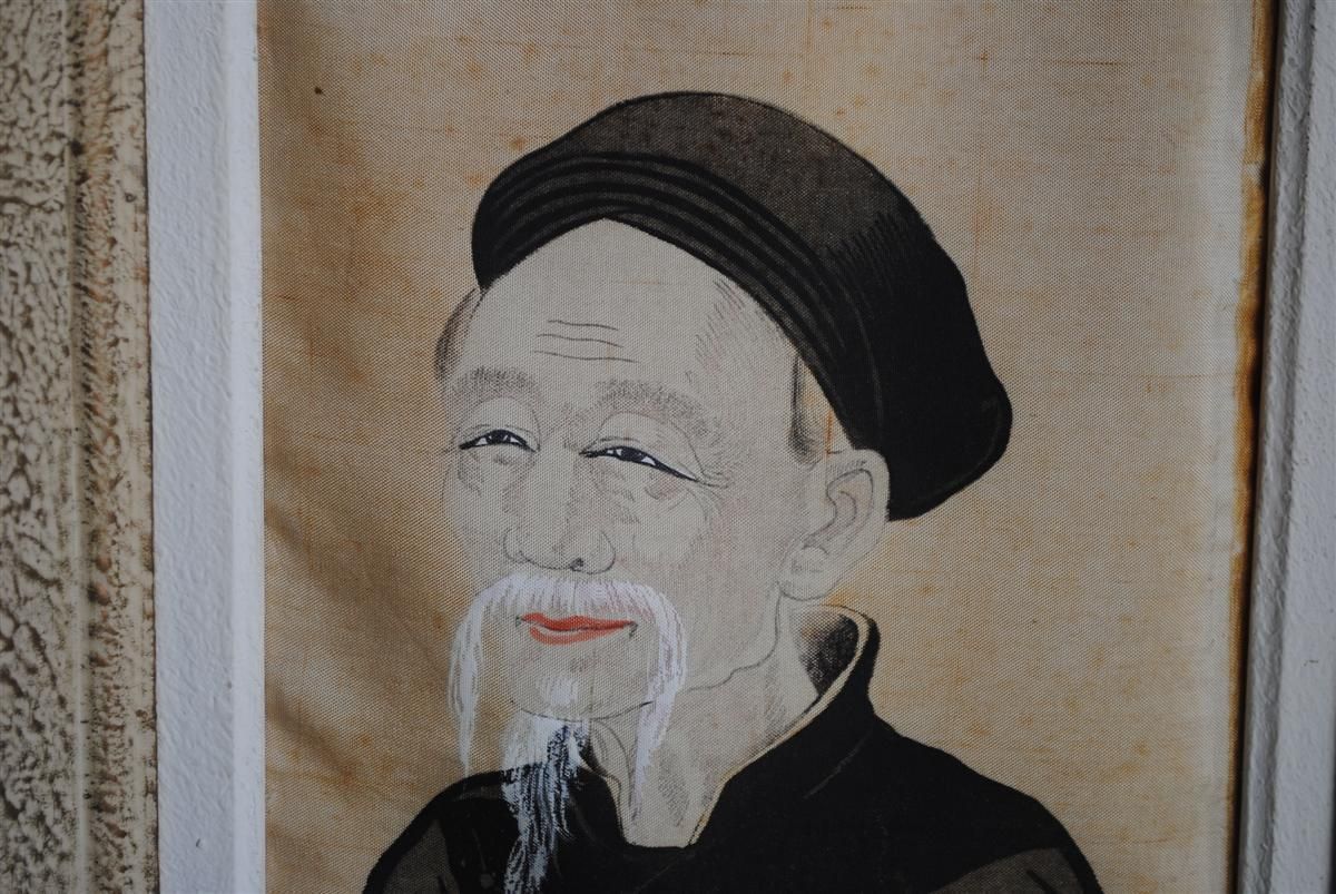 Old Asian Portrait On Silk. photo furniture