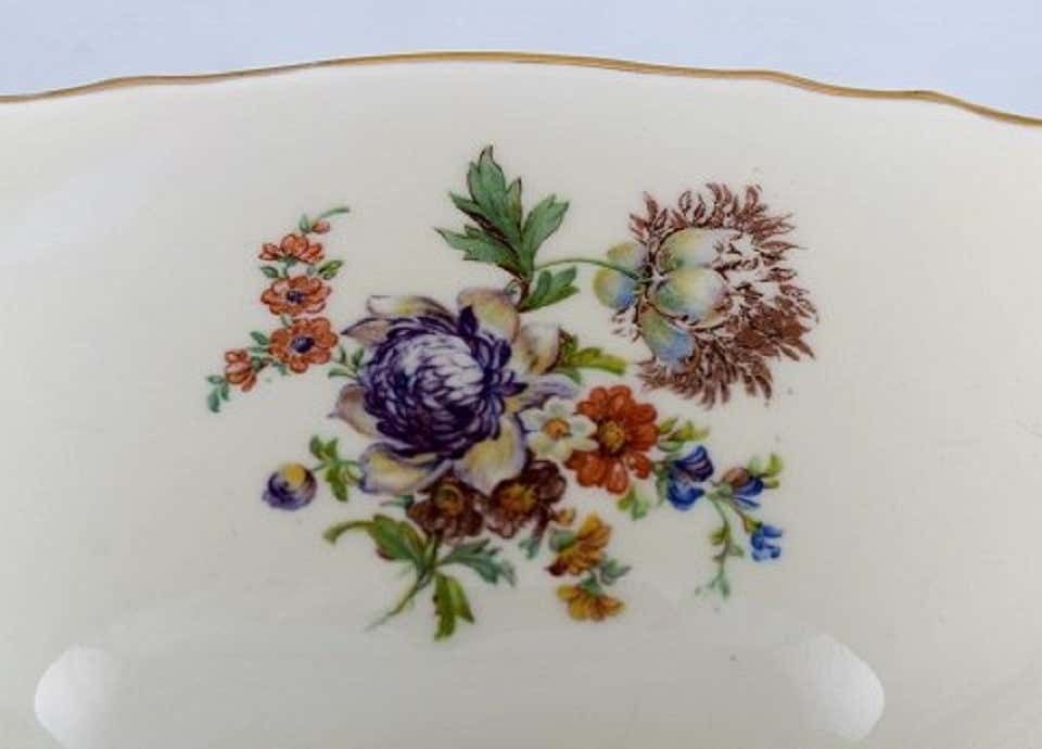 Royal Copenhagen Porcelain Sauce Boat With Floral Motifs And Gold Border photo for sale