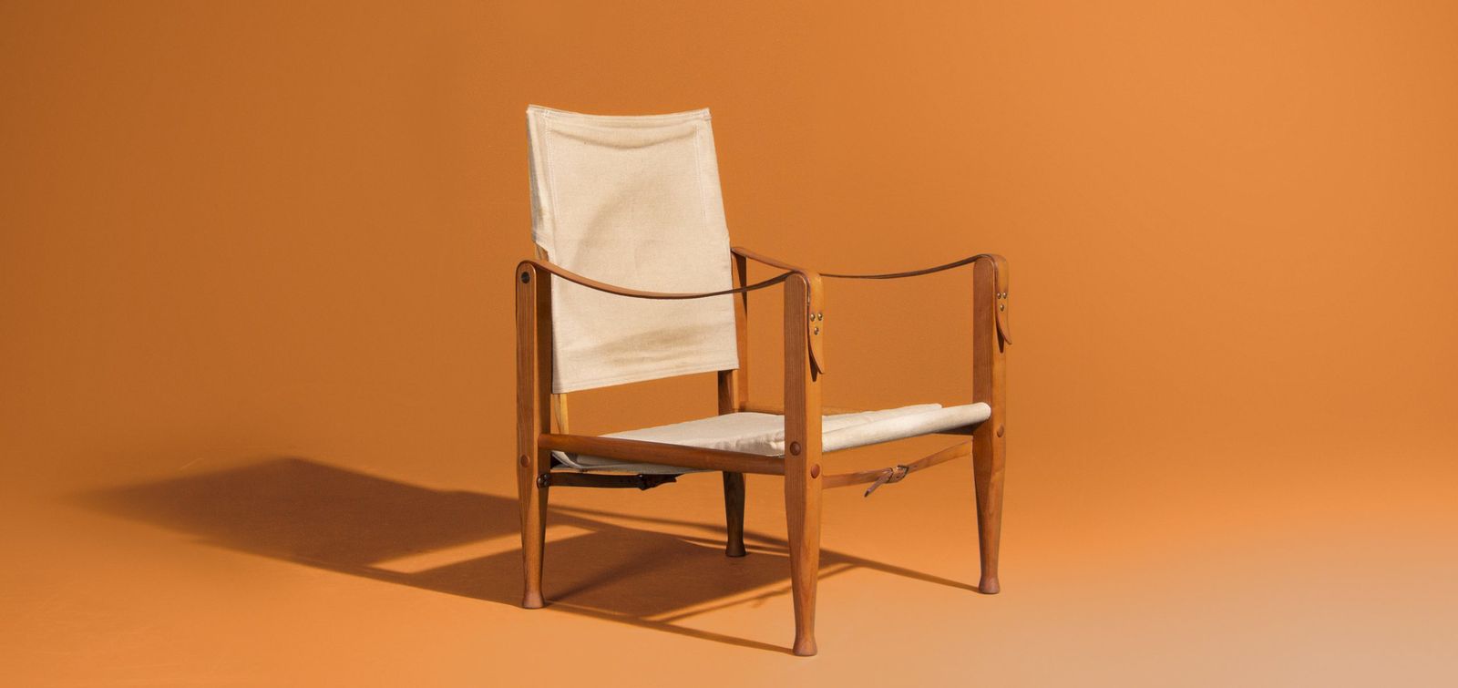 Kaare Klint Safari Chair Produced By Rud Rasmussen photo furniture