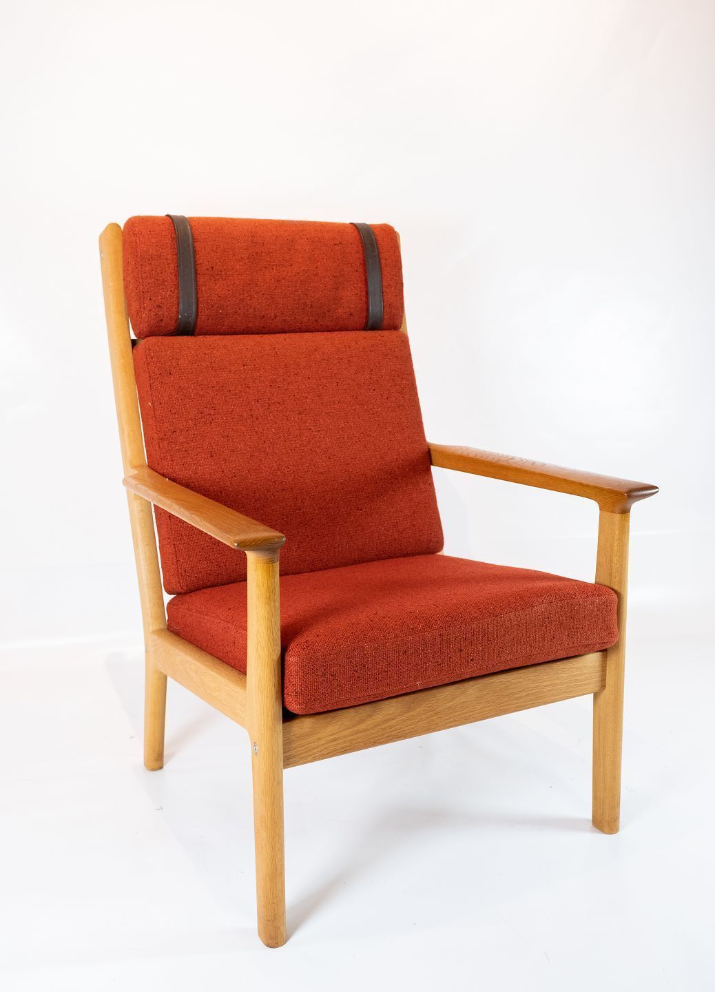 High Armchair In Oak And Red Wool Fabric By Hans J. Wegner And Getama From The 1960s.